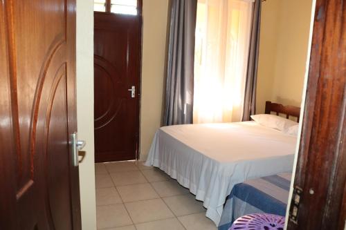 Postel nebo postele na pokoji v ubytování FLORENCE APARTMENTS C