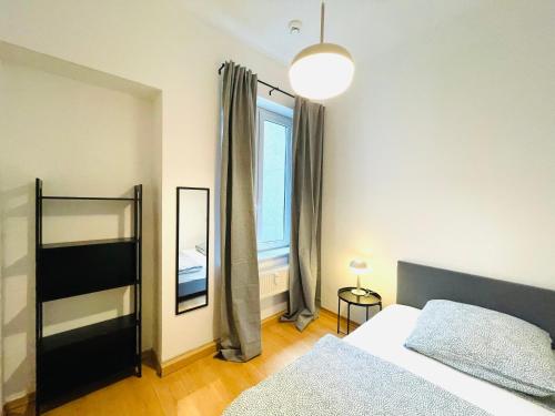 Postel nebo postele na pokoji v ubytování VIKTORIA RESIDENCE