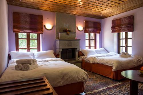 En eller flere senge i et værelse på Ελευθερία