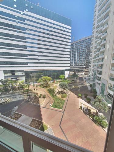 a view from a window of a large building at Flat Saint Moritz Express By Rei dos Flats in Brasilia