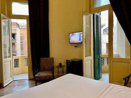 TV a/nebo společenská místnost v ubytování Philo Hotel