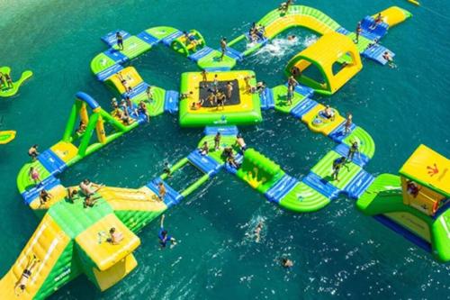 an overhead view of an inflatable water park at Cozy Condo at the Lake in Sylvan Lake