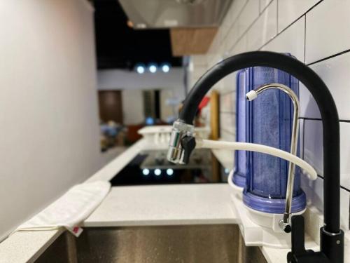 a kitchen sink with a faucet on a counter at (New) Fettes Villa for 20Pax @CentralPenang/Gurney in George Town