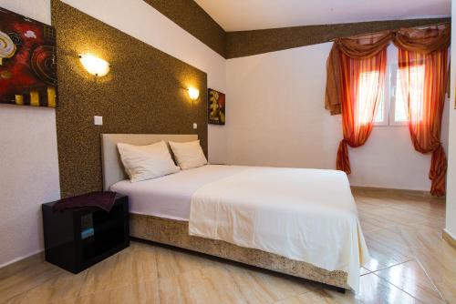 Katil atau katil-katil dalam bilik di Hotel Wellness & Spa Angelo Gabriel