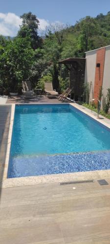 Kolam renang di atau dekat dengan pousada essência
