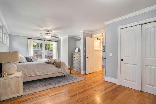 a bedroom with a bed and a window at Living Among The Oaks in Stevensville