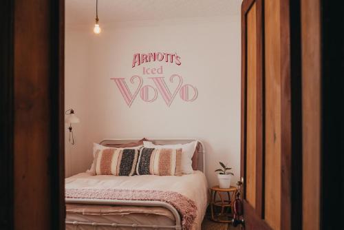 מיטה או מיטות בחדר ב-William Arnott Boutique Accommodation