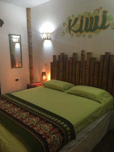 A bed or beds in a room at CASITA MADAME