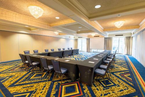 a conference room with a long table and chairs at Drury Plaza St. Louis at the Arch in Saint Louis