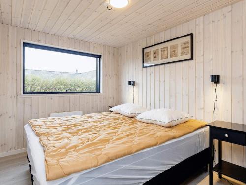 Postel nebo postele na pokoji v ubytování Holiday home Idestrup XXII