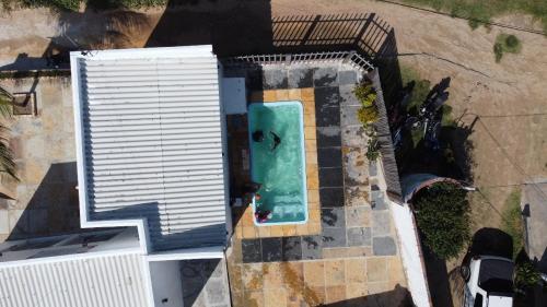 an overhead view of a swimming pool on a building at Pousada Lua Branca in Tutóia