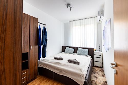 Katil atau katil-katil dalam bilik di Zoe apartman