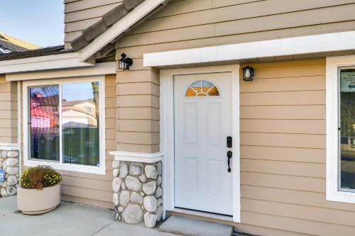 a house with a white door and windows at Conveniently Located Fontana Apartment! in Fontana