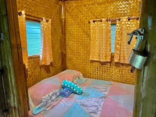 Ένα ή περισσότερα κρεβάτια σε δωμάτιο στο Blue Moon Guesthouse