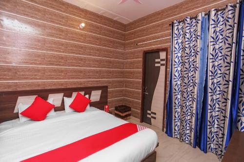 Katil atau katil-katil dalam bilik di Flagship Hotel Owish