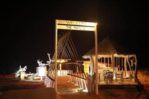 a sign that says well come to the market at night at Laya Safari Resorts & Spa in Yala