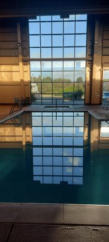 a large pool of water in a building at Hotel Mar Vista in Ocean Shores