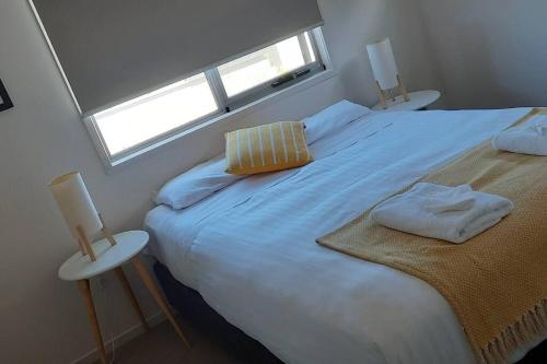 Una cama o camas en una habitación de Vivid Air
