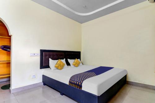 Cama ou camas em um quarto em SPOT ON Unik Residency