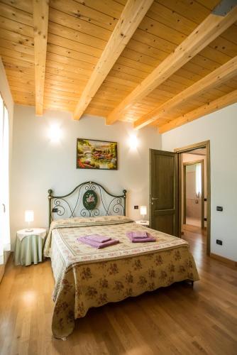 Postel nebo postele na pokoji v ubytování Case Vacanza Orchidea