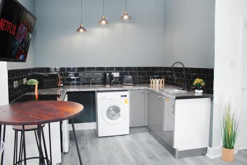 A cozinha ou cozinha compacta de Chic Studio Apartment in Liverpool