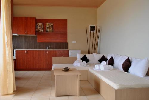 Χώρος καθιστικού στο Iliovasilema Hotel