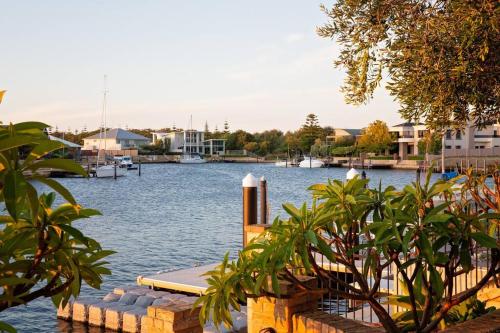 a view of a body of water with a marina at Luxury Waterfront Canal Estate With Private Jetty - Pet Friendly in Busselton
