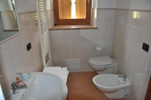 Koupelna v ubytování Agriturismo Corte dei Fiori