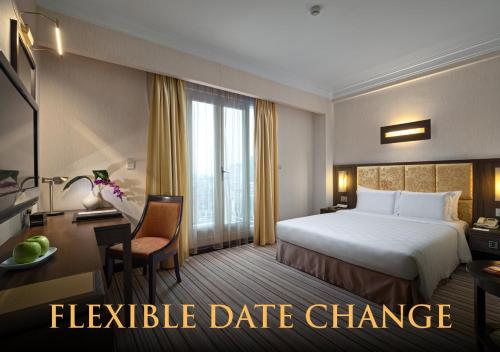 Postel nebo postele na pokoji v ubytování Silk Path Hotel Hanoi