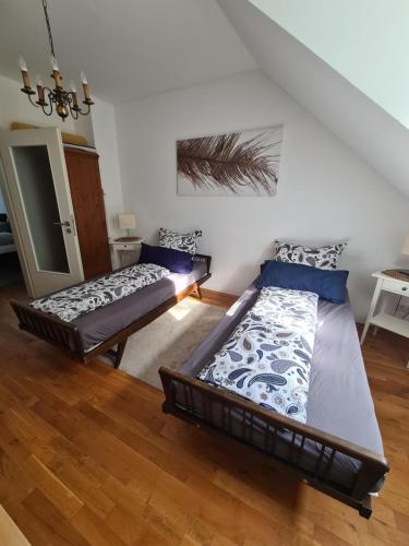 Postel nebo postele na pokoji v ubytování Ferienwohnung Hardtblick