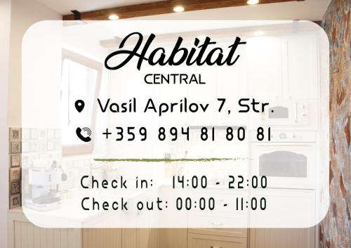 a window display of a kitchen with a sign that reads albatrit central rental at Habitat Central Apartment in Ruse