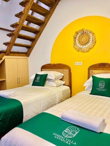 Postel nebo postele na pokoji v ubytování Sampai Villa Antapura
