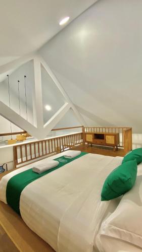 Postel nebo postele na pokoji v ubytování Sampai Villa Antapura