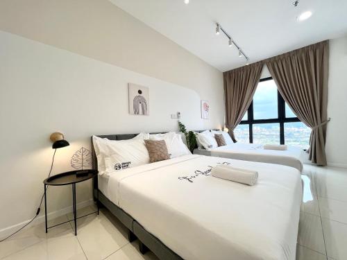 Katil atau katil-katil dalam bilik di HighPark Suites Kelana Jaya, Petaling Jaya by Sleepy Bear