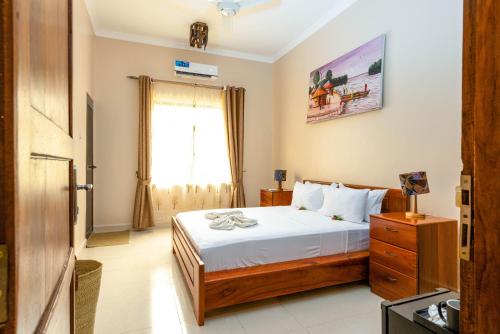 Voodi või voodid majutusasutuse Shivo Guest House toas