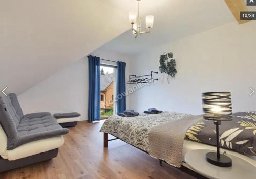 Postel nebo postele na pokoji v ubytování APARTAMENTY UL.SARNIA