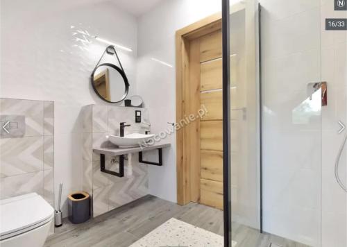 Koupelna v ubytování APARTAMENTY UL.SARNIA