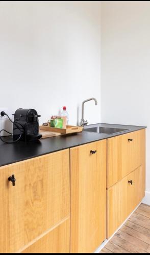 Η κουζίνα ή μικρή κουζίνα στο Bohemian city loft
