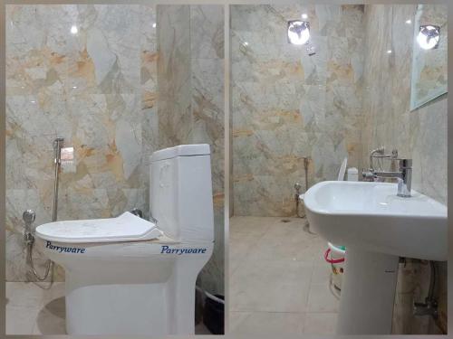 a bathroom with a toilet and a sink at Hotel O Maa Yashodha Palace in Ayodhya