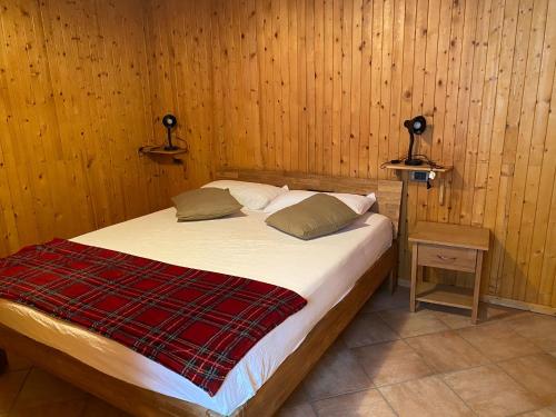 Ein Bett oder Betten in einem Zimmer der Unterkunft Testa Grigia