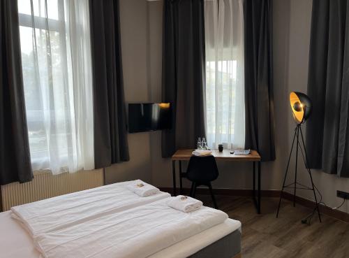 Katil atau katil-katil dalam bilik di Hotel Restaurant zum Löwen