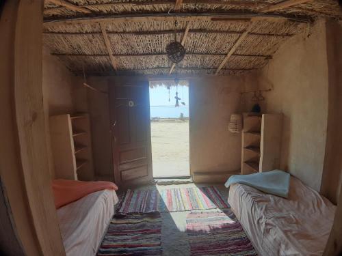 Una cama o camas en una habitación de M Biama Island