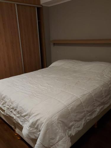 Кровать или кровати в номере Deptos Michell (vista al mar )