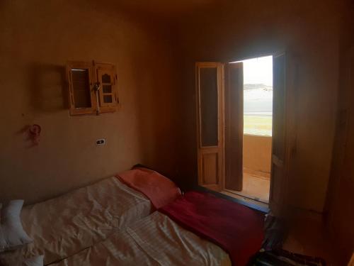 Una cama o camas en una habitación de M Biama Island