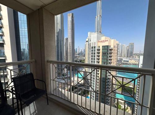a balcony with a view of a city at Downtown Apartments with Fountain and Burj Khalifa View in Dubai