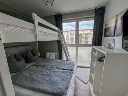 Katil atau katil-katil dalam bilik di Familienurlaub direkt am Meer 300m