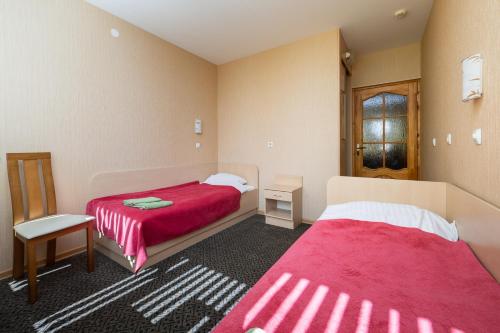 Postel nebo postele na pokoji v ubytování Balvi Hotel