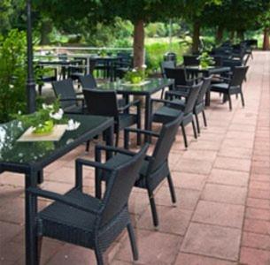 a row of tables and chairs at a restaurant at Marienthaler Gasthof in Marienthal