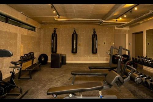 a gym with a bunch of chairs in a room at Studio apartment at Blackbrick 2 in Johannesburg