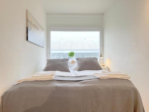 Ein Bett oder Betten in einem Zimmer der Unterkunft Three Bedroom Apartment In Valby, Langagervej 66,